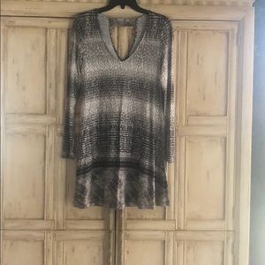 Adorable mini swing dress.